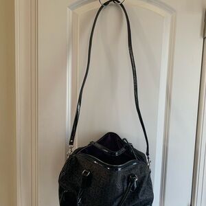 Coach Black Shoulder Bag with Slouchy Hobo Shape and Long Strap